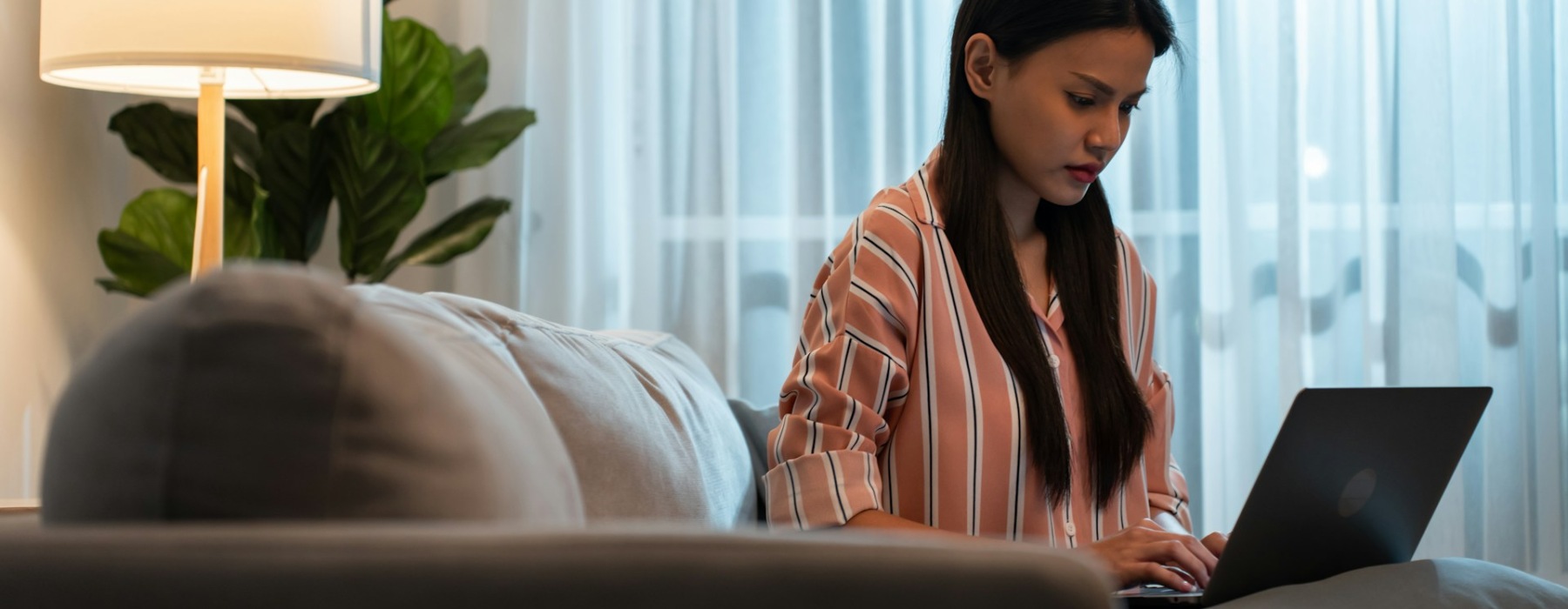 a woman using a laptop